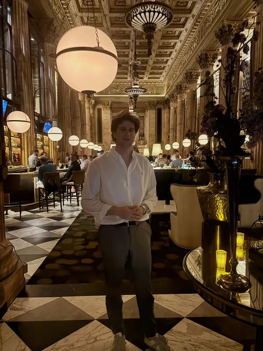 Andy in a grand dining hall in Cleveland